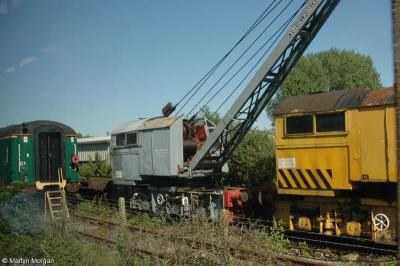 image showing a large yellow on-track machine