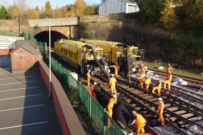 image showing a large yellow on-track machine