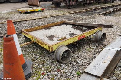 image showing a large yellow on-track machine