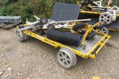 image showing a large yellow on-track machine
