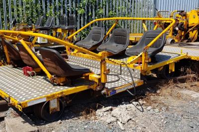 image showing a large yellow on-track machine