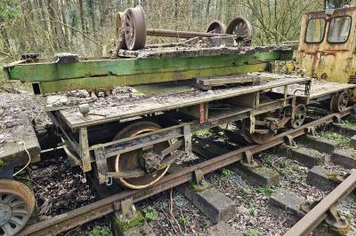 image showing a large yellow on-track machine