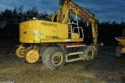 image showing a large yellow on-track machine