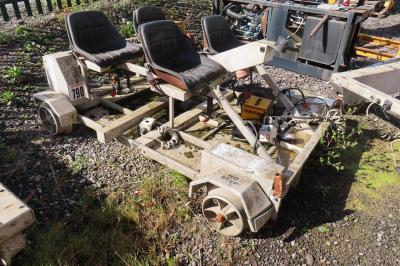 image showing a large yellow on-track machine