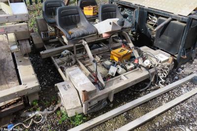 image showing a large yellow on-track machine