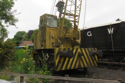 image showing a large yellow on-track machine