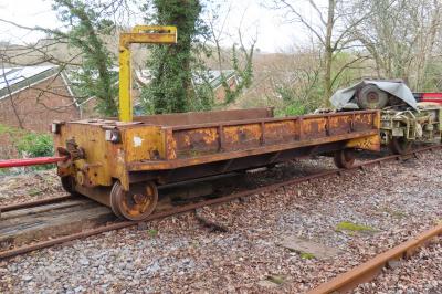 image showing a large yellow on-track machine