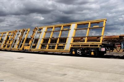 image showing a large yellow on-track machine