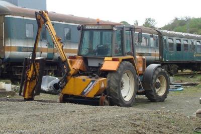 image showing a large yellow on-track machine