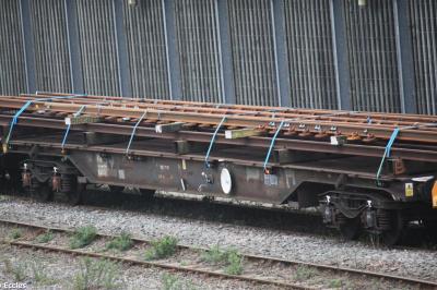 image showing a large yellow on-track machine