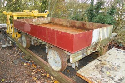 image showing a large yellow on-track machine