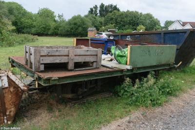 image showing a large yellow on-track machine