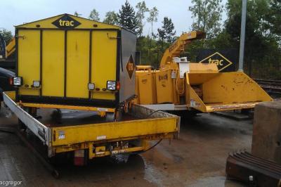 image showing a large yellow on-track machine