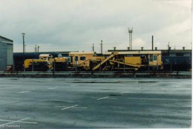 image showing a large yellow on-track machine