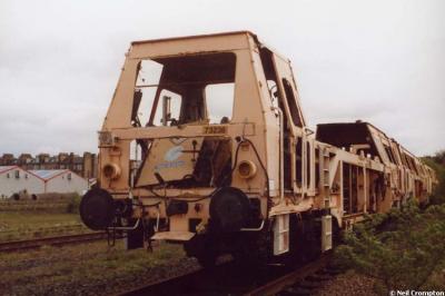 image showing a large yellow on-track machine