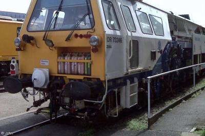 image showing a large yellow on-track machine