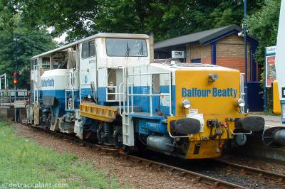 image showing a large yellow on-track machine