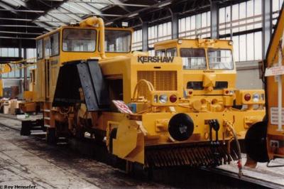 image showing a large yellow on-track machine