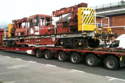 image showing a large yellow on-track machine