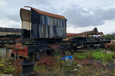 image showing a large yellow on-track machine