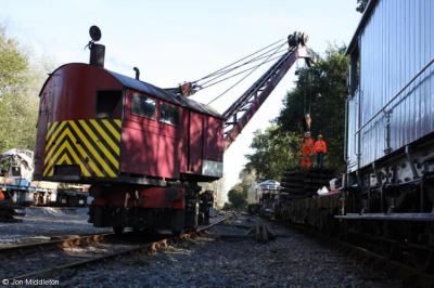 image showing a large yellow on-track machine