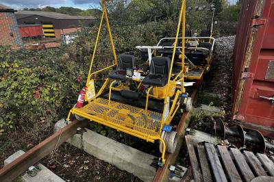 image showing a large yellow on-track machine