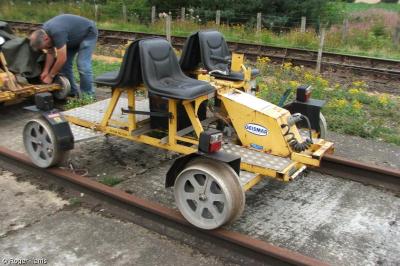 image showing a large yellow on-track machine