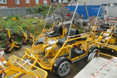 image showing a large yellow on-track machine