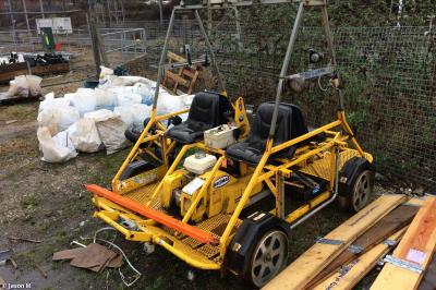 image showing a large yellow on-track machine