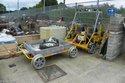 image showing a large yellow on-track machine