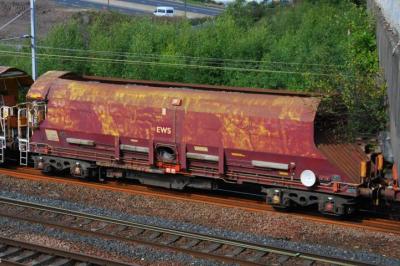 image showing a large yellow on-track machine