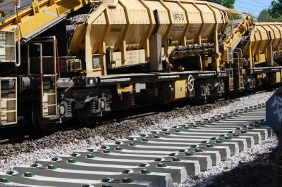 image showing a large yellow on-track machine
