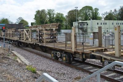 image showing a large yellow on-track machine