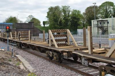 image showing a large yellow on-track machine