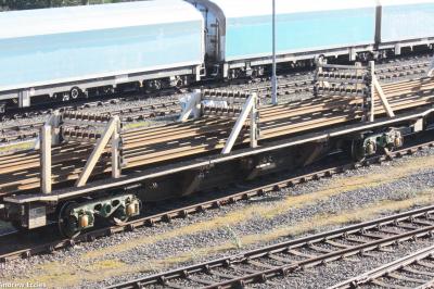 image showing a large yellow on-track machine