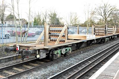 image showing a large yellow on-track machine