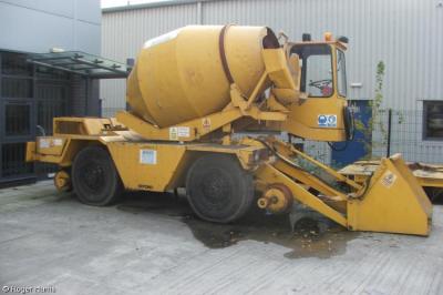 image showing a large yellow on-track machine