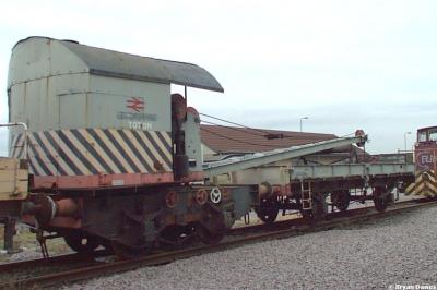 image showing a large yellow on-track machine