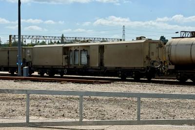 image showing a large yellow on-track machine