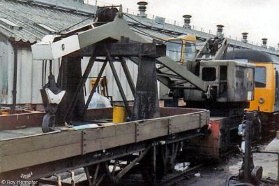 image showing a large yellow on-track machine