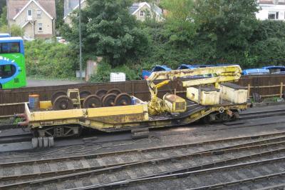 image showing a large yellow on-track machine