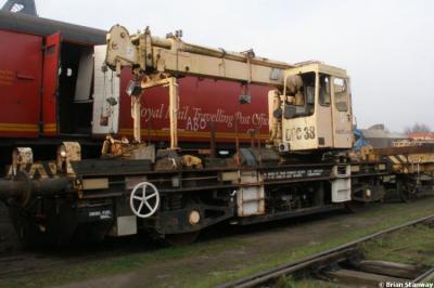 image showing a large yellow on-track machine