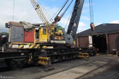 image showing a large yellow on-track machine
