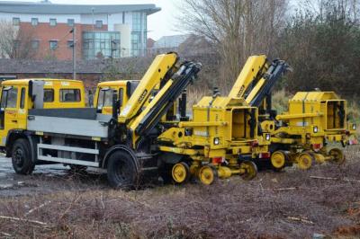 image showing a large yellow on-track machine