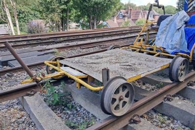 image showing a large yellow on-track machine