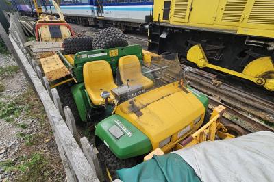image showing a large yellow on-track machine