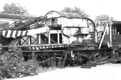 image showing a large yellow on-track machine