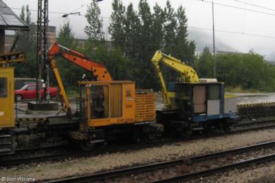 image showing a large yellow on-track machine