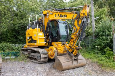 image showing a large yellow on-track machine