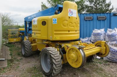 image showing a large yellow on-track machine